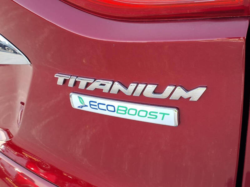 Used 2015 Ford Escape Titanium with VIN 1FMCU0JX2FUC34957 for sale in Wood River, IL