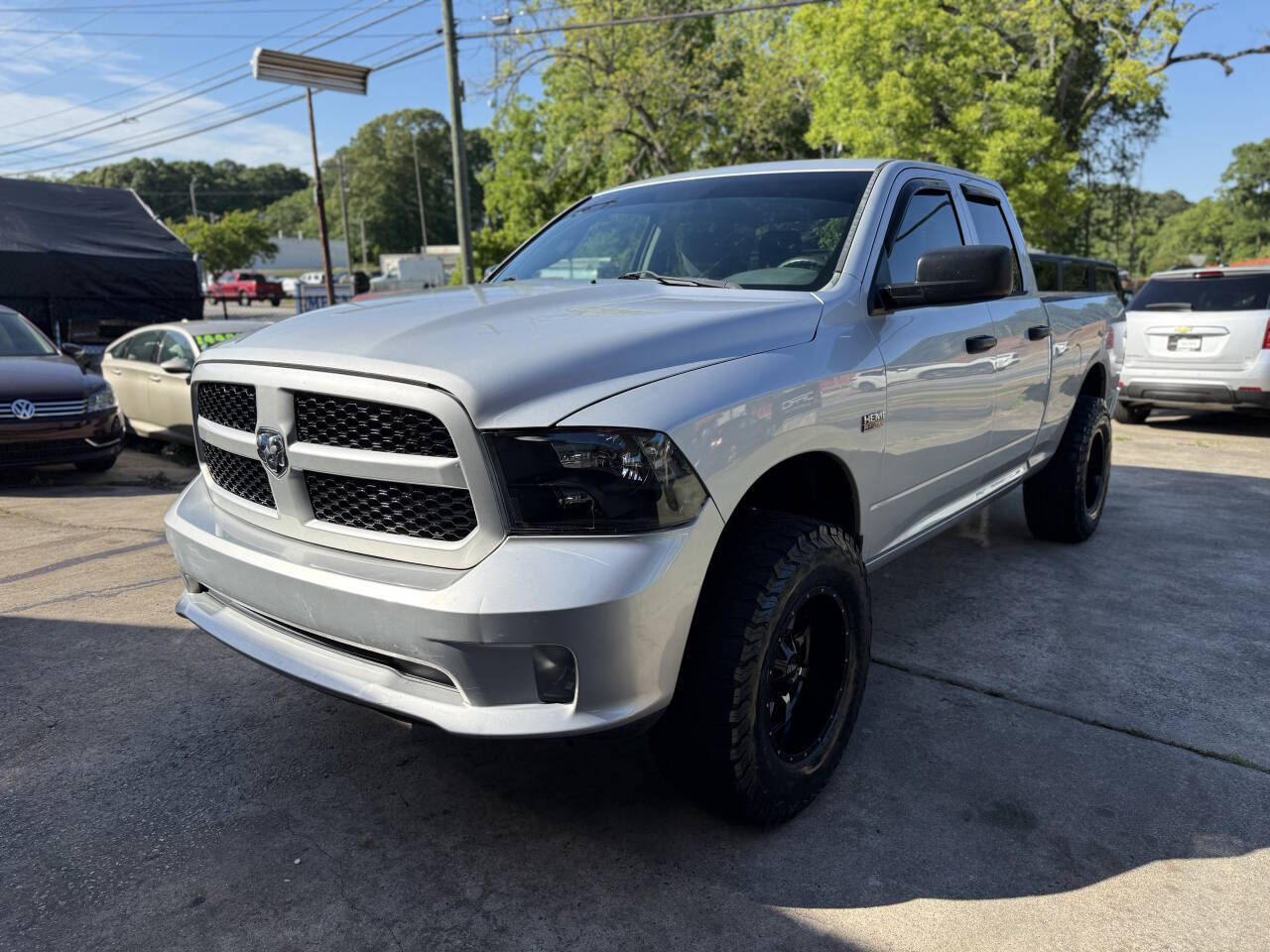 Silver 2014 Ram 1500 Express 4x4 Express 4dr Quad Cab 6.3 ft. SB Pickup 1