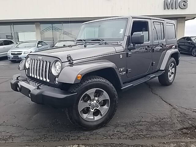 Used 2018 Jeep Wrangler JK Unlimited Sahara with VIN 1C4BJWEG4JL850678 for sale in Bellefontaine, OH