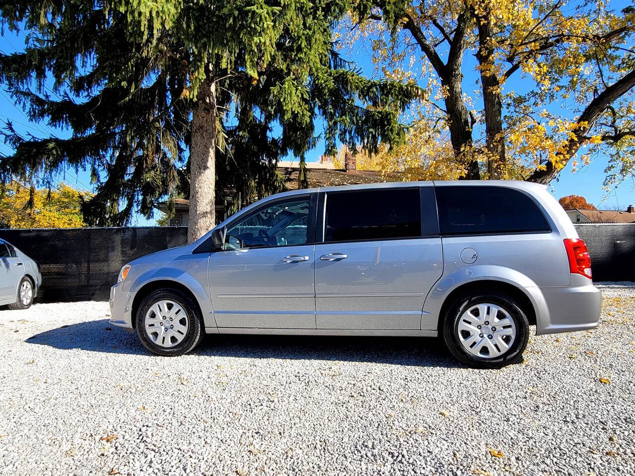 2014 Dodge Grand Caravan for sale at Statewide Auto LLC in Akron, OH