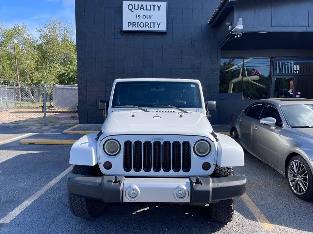 2012 Jeep Wrangler Unlimited for sale at INTEGRITY AUTO in Dothan, AL