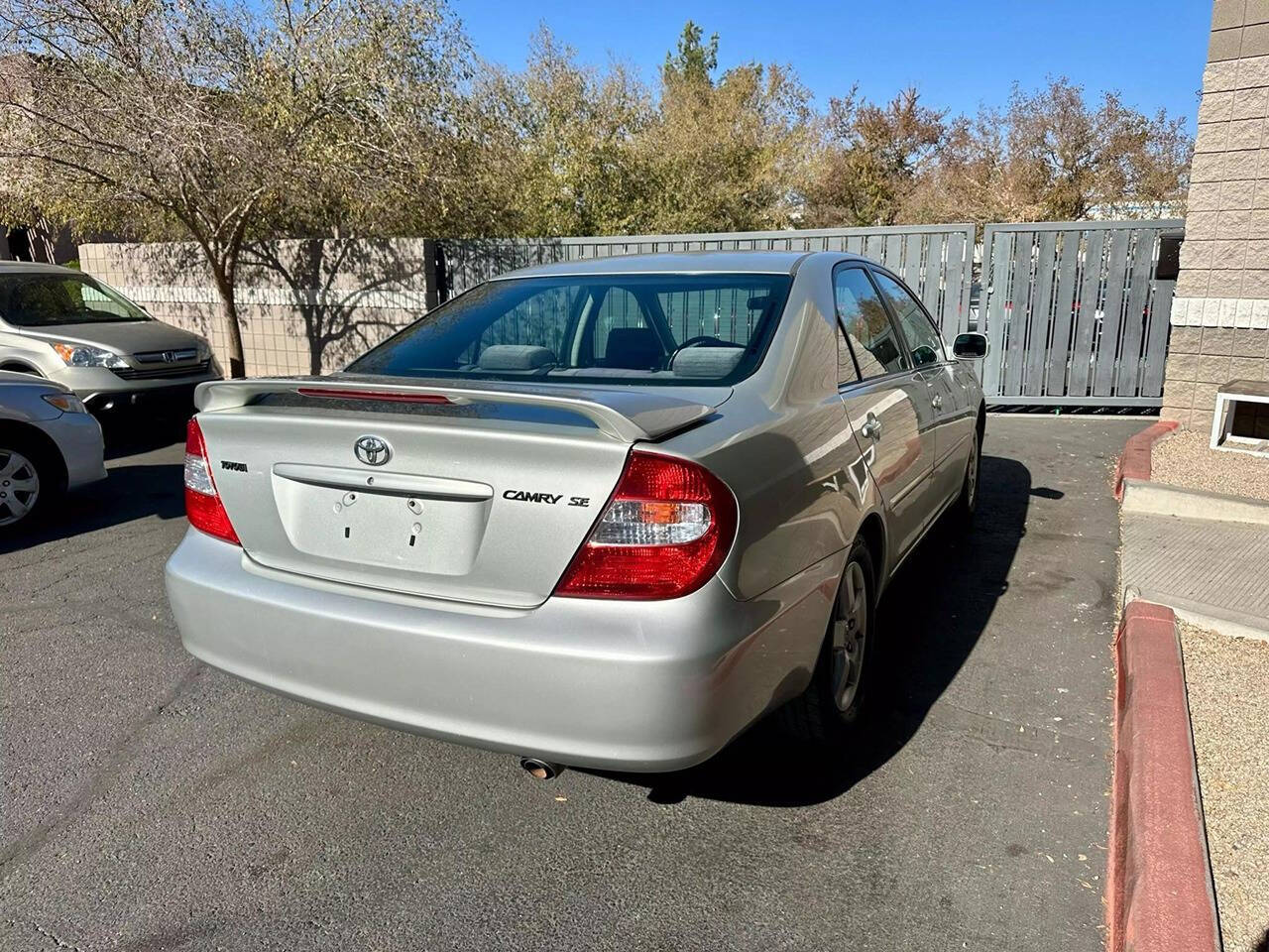 2003 Toyota Camry for sale at HUDSONS AUTOS in Gilbert, AZ