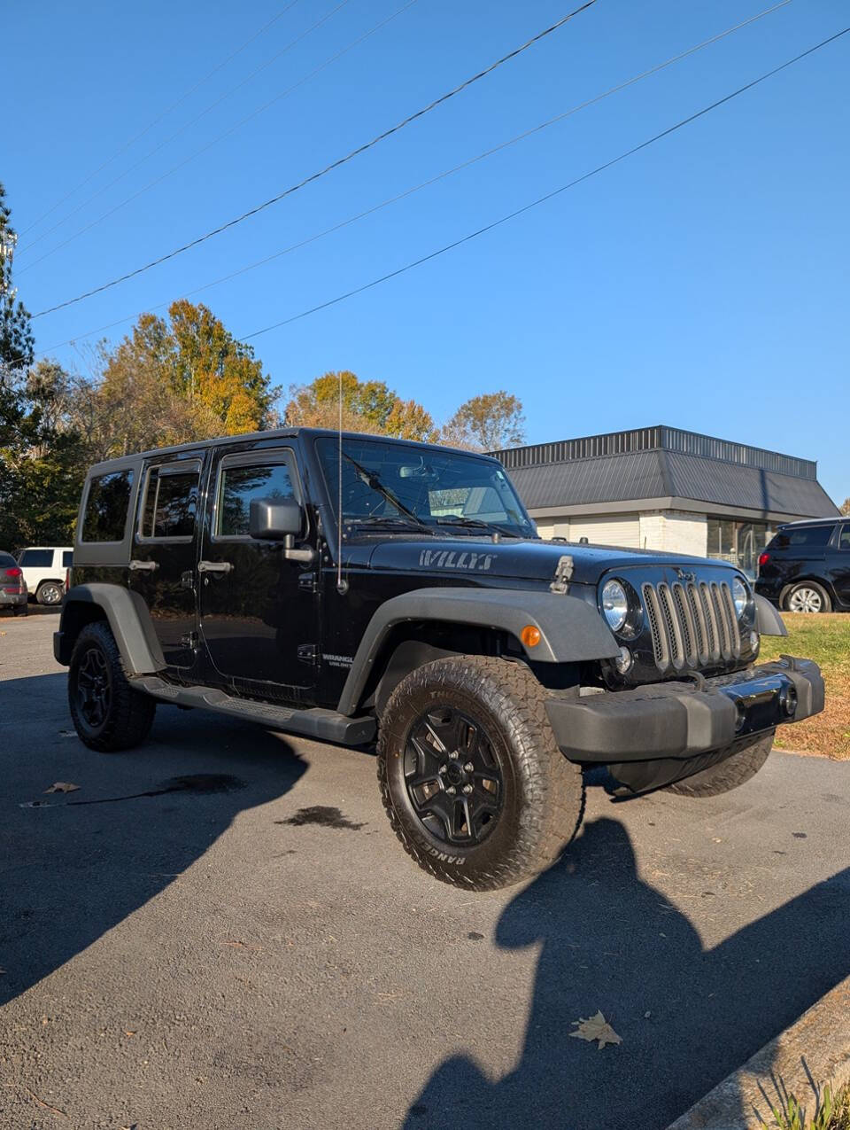 2015 Jeep Wrangler Unlimited for sale at BARRETT & SONS in Milledgeville, GA