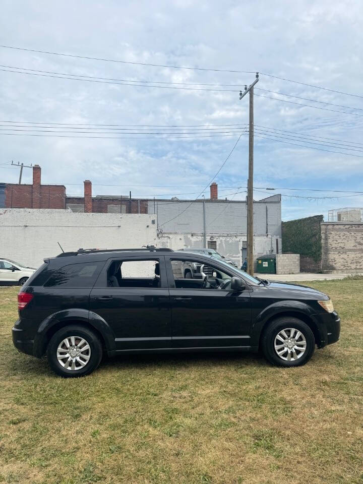 2010 Dodge Journey for sale at H & H AUTO GROUP in Detroit, MI