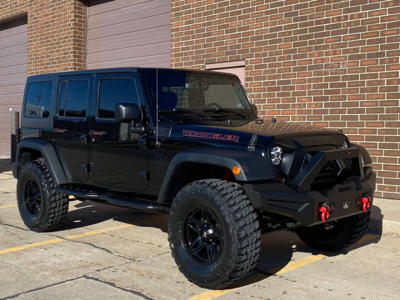 2013 Jeep Wrangler Unlimited for sale at Effect Auto Center in Omaha NE