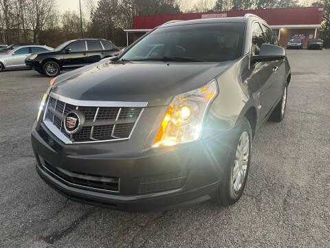 2012 Cadillac SRX for sale at Certified Motors LLC in Mableton GA