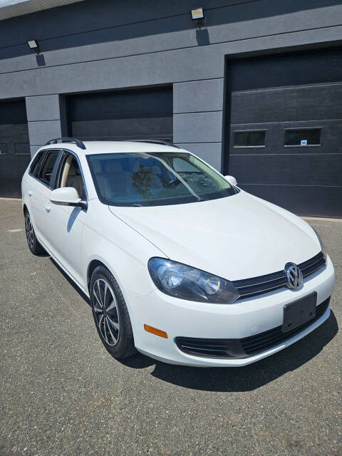 2014 Volkswagen Jetta for sale at RENOS AUTO SALES LLC in Waterbury, CT