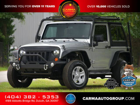 2012 Jeep Wrangler for sale at Carma Auto Group in Duluth GA