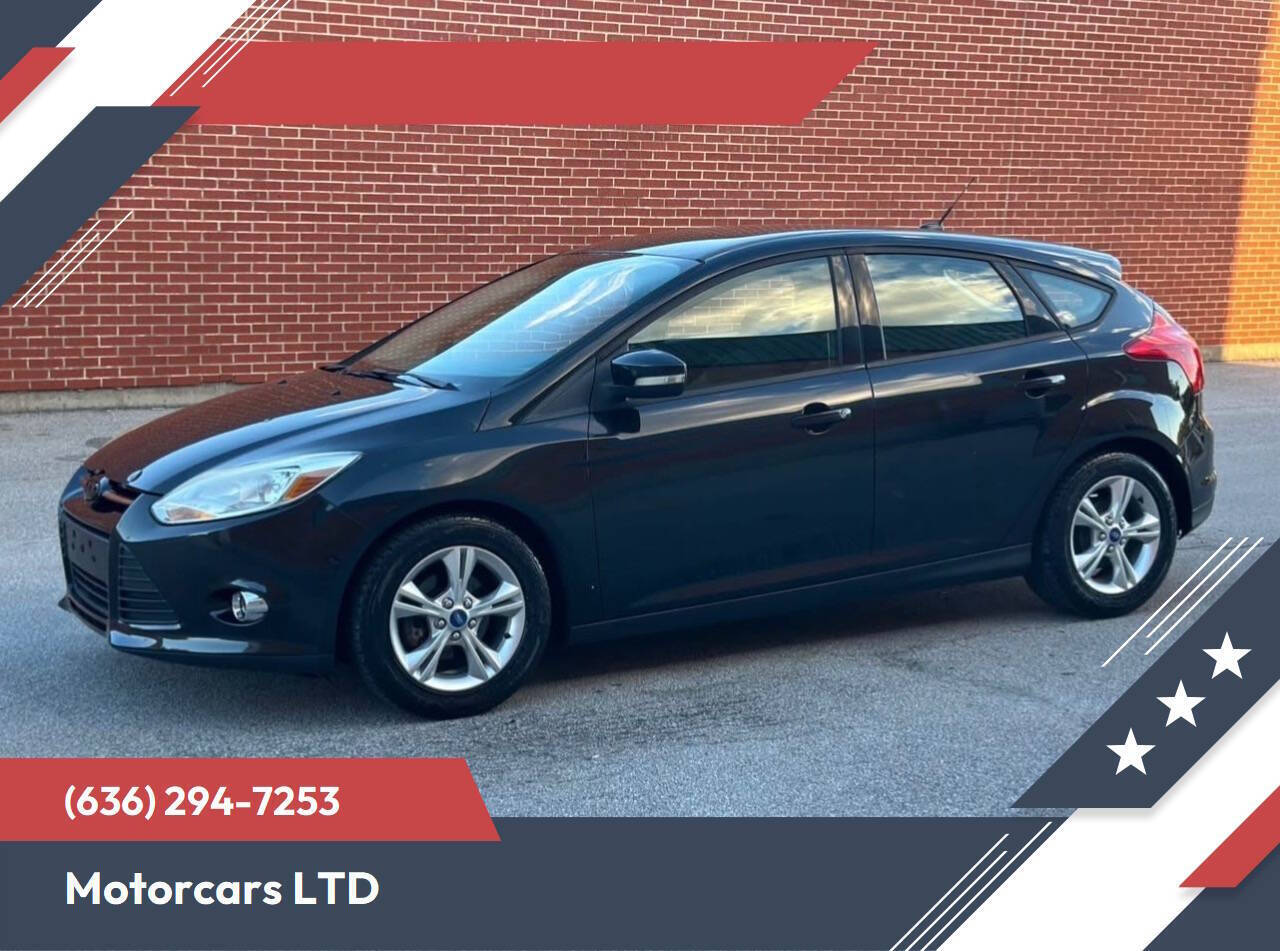 Black 2013 Ford Focus SE SE 4dr Hatchback 1