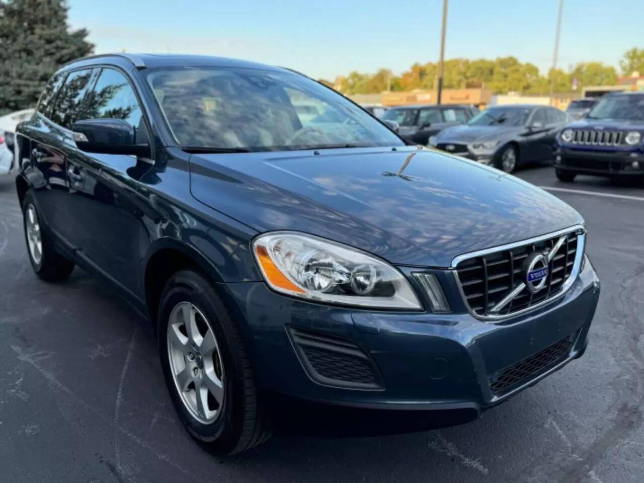 2012 Volvo XC60 for sale at Opus Motorcars in Utica, MI