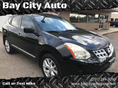 2013 Nissan Rogue for sale at Bay City Auto's in Mobile AL