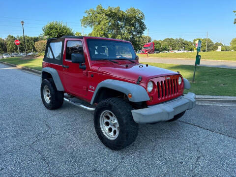 2009 Jeep Wrangler for sale at First Auto Sales in Winder GA