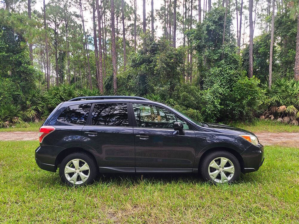 2014 Subaru Forester for sale at Flagler Auto Center in Bunnell, FL