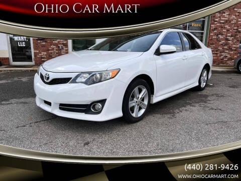 2012 Toyota Camry for sale at Ohio Car Mart in Elyria OH