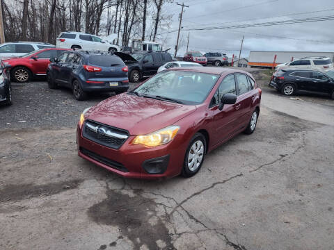 2013 Subaru Impreza for sale at Mario's Auto Repair and Sales LLC in Duryea PA