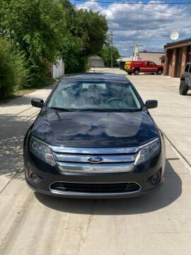 2012 Ford Fusion for sale at Suburban Auto Sales LLC in Madison Heights MI