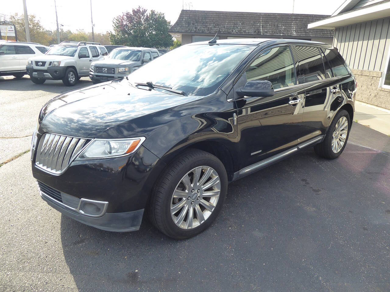 2011 Lincoln MKX for sale at Lakeshore Autos in Holland, MI