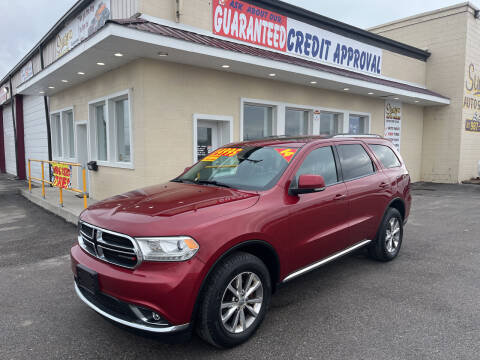 2014 Dodge Durango for sale at Suarez Auto Sales in Port Huron MI