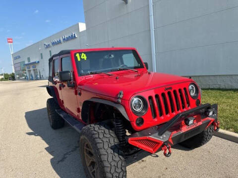 2014 Jeep Wrangler Unlimited for sale at Tom Wood Honda in Anderson IN