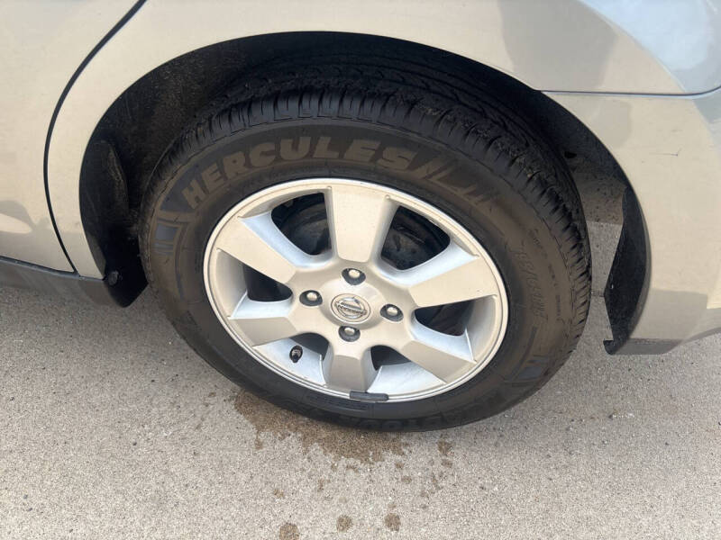 2009 Nissan Versa 1.8 SL FE+