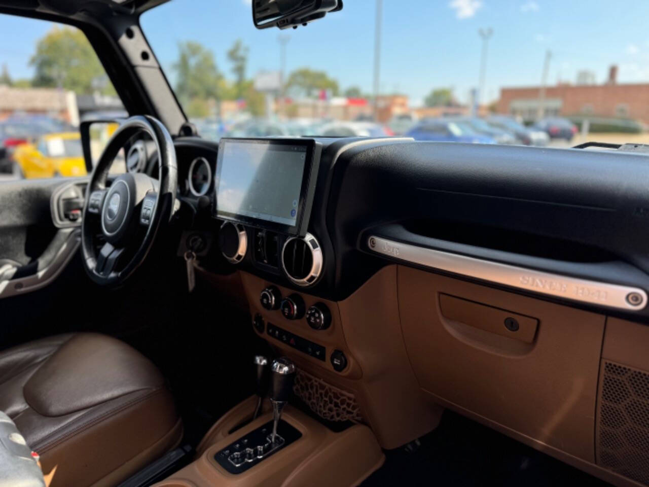 2014 Jeep Wrangler Unlimited for sale at Opus Motorcars in Utica, MI