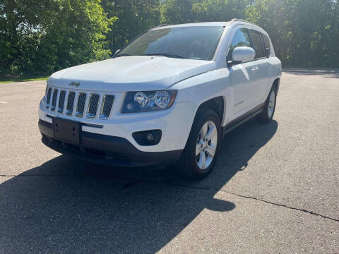 2014 Jeep Compass for sale at Rombaugh's Auto Sales in Battle Creek MI