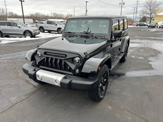 2015 Jeep Wrangler Unlimited for sale at Wyrick Auto Sales & Leasing Inc in Holland, MI