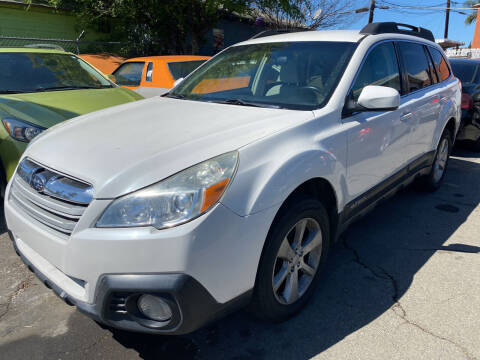 2014 Subaru Outback for sale at UNIQUE AUTOMOTIVE GROUP in San Diego CA