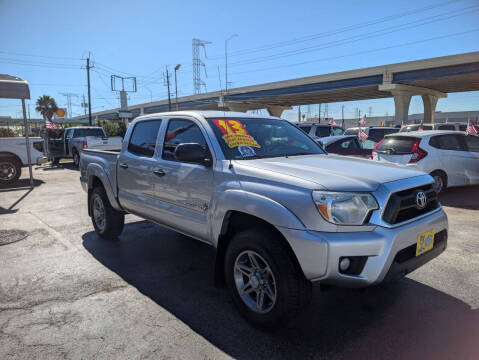 2013 Toyota Tacoma for sale at Texas 1 Auto Finance in Kemah TX