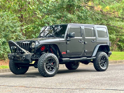 2012 Jeep Wrangler Unlimited for sale at H and S Auto Group in Canton GA