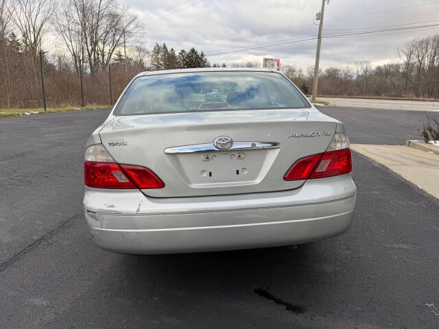 2003 Toyota Avalon for sale at Exclusive Auto Group of Michigan LLC in Lansing, MI