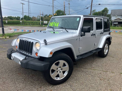 2009 Jeep Wrangler Unlimited for sale at Grims Auto Sales in North Lawrence OH