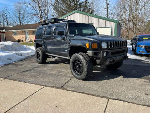 2009 HUMMER H3 for sale at Rombaugh's Auto Sales in Battle Creek MI