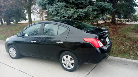 2012 Nissan Versa for sale at Heartbeat Used Cars & Trucks in Harrison Township MI