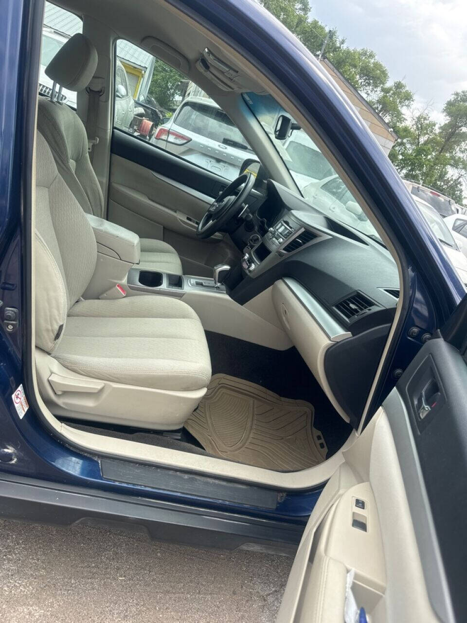 2011 Subaru Outback for sale at Calderon Auto Sales in Des Moines, IA