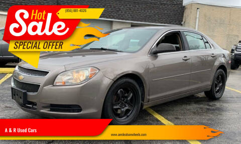2012 Chevrolet Malibu for sale at A & R Used Cars in Clayton NJ