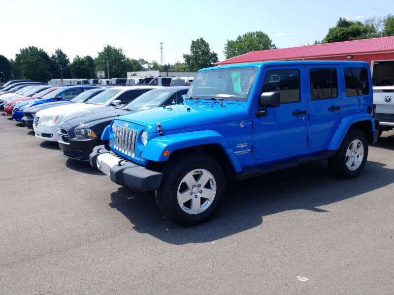 2012 Jeep Wrangler Unlimited for sale at M & H Auto & Truck Sales Inc. in Marion IN