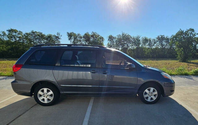 2006 Toyota Sienna for sale at CAR MARKET AUTO GROUP in Sugar Land, TX