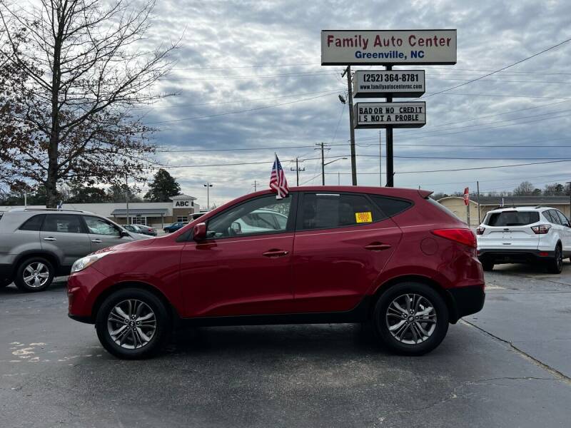 2015 Hyundai Tucson for sale at FAMILY AUTO CENTER in Greenville NC