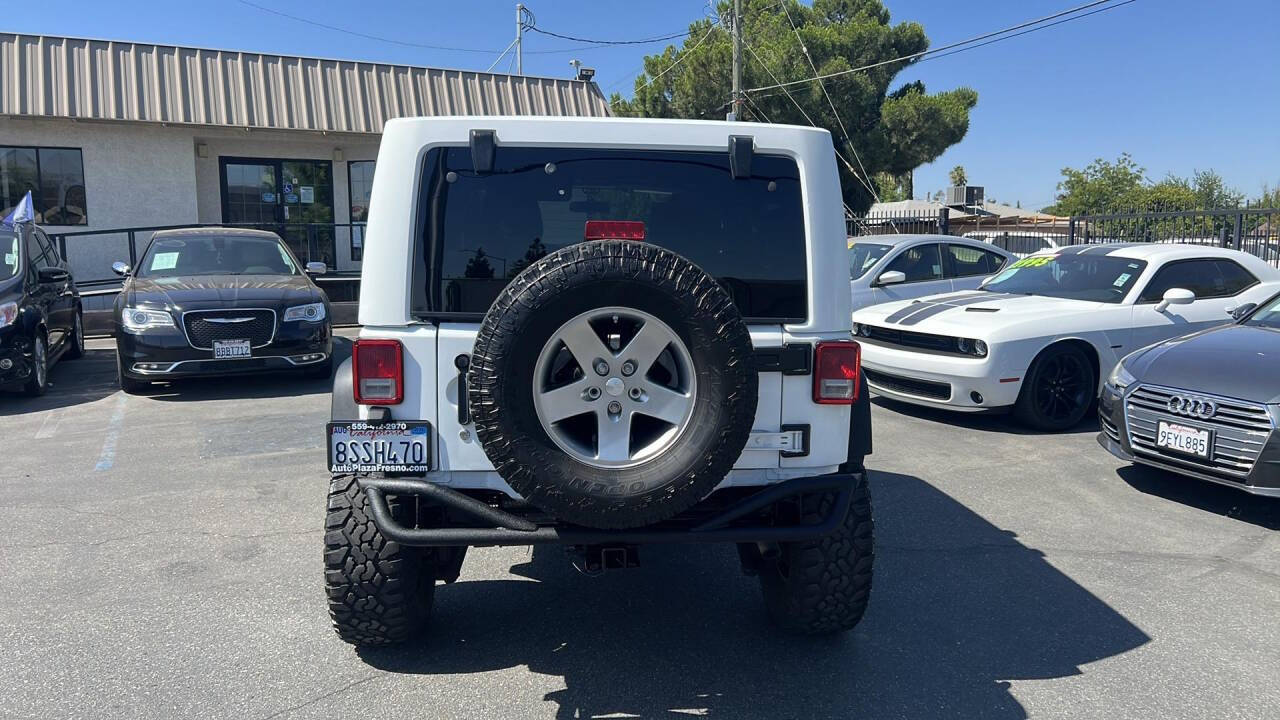 2012 Jeep Wrangler Unlimited for sale at Auto Plaza in Fresno, CA