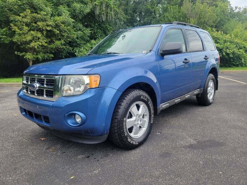 2009 Ford Escape for sale at Spectra Autos LLC in Akron OH