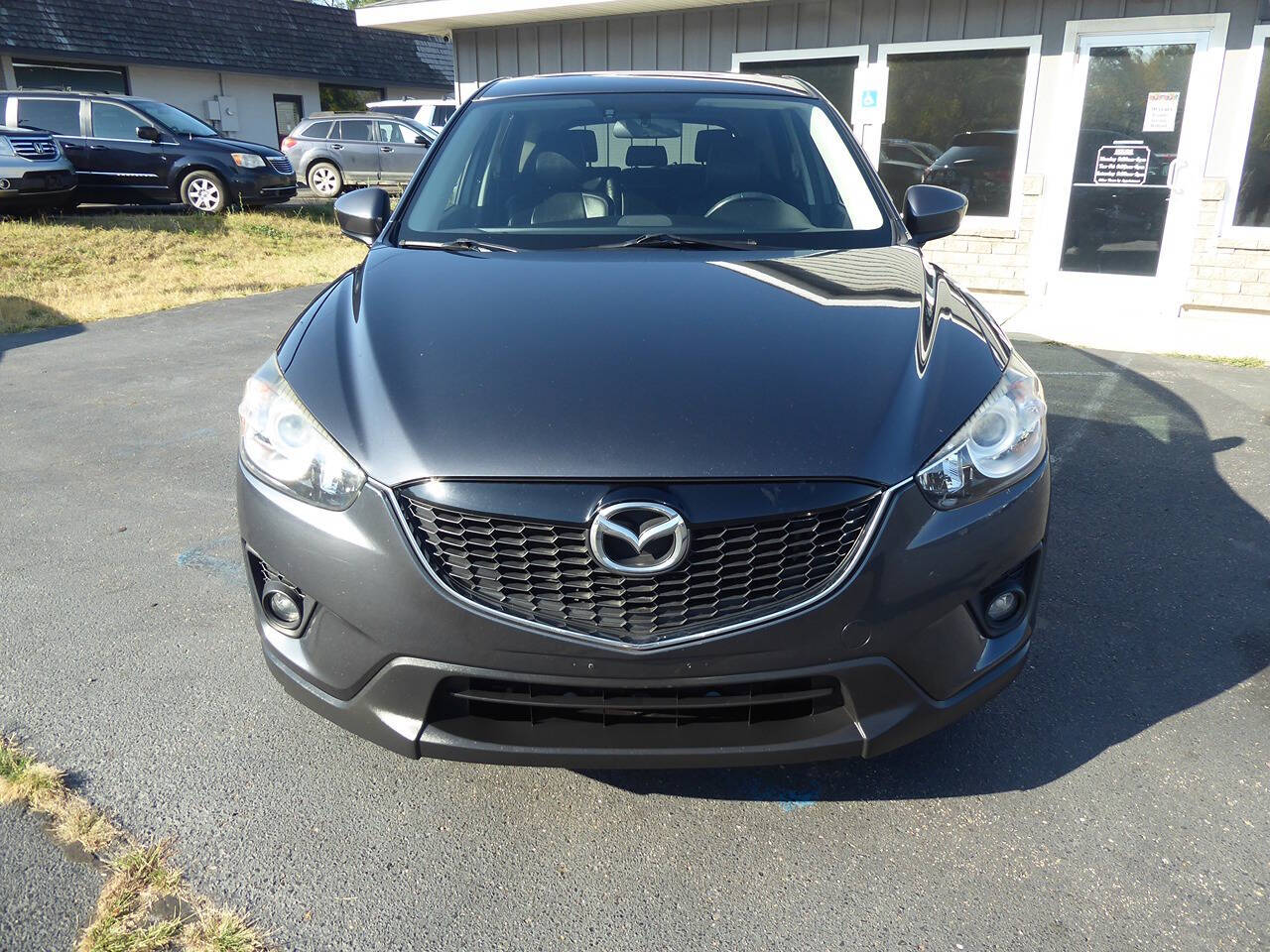 2014 Mazda CX-5 for sale at Lakeshore Autos in Holland, MI