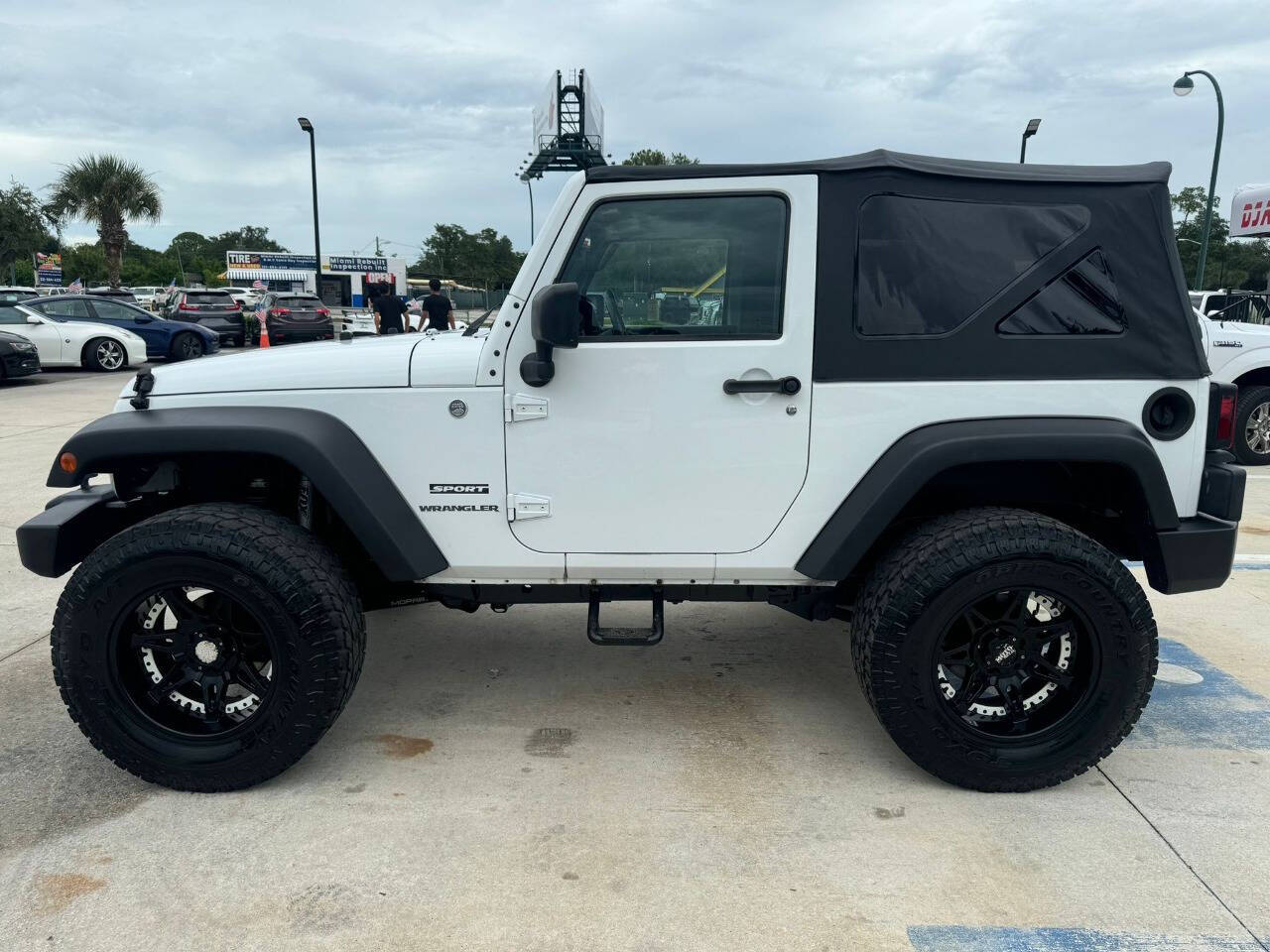 2014 Jeep Wrangler for sale at DJA Autos Center in Orlando, FL