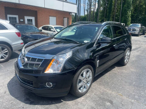 2012 Cadillac SRX for sale at Magic Motors Inc. in Snellville GA