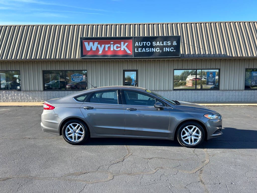 2014 Ford Fusion for sale at Wyrick Auto Sales & Leasing Inc in Zeeland, MI