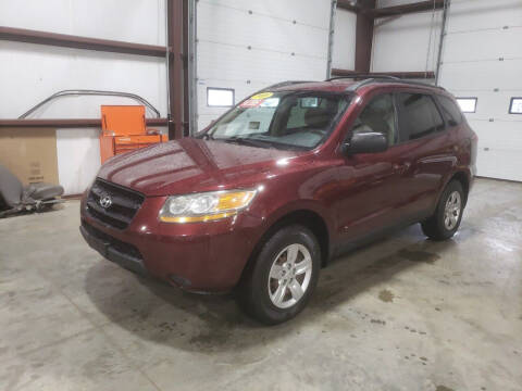 2009 Hyundai Santa Fe for sale at Hometown Automotive Service & Sales in Holliston MA