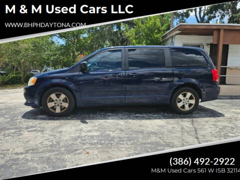 2014 Dodge Grand Caravan for sale at M & M Used Cars LLC in Daytona Beach FL