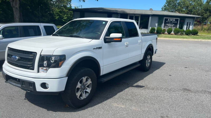 2014 Ford F-150 for sale at AMG Automotive Group in Cumming GA