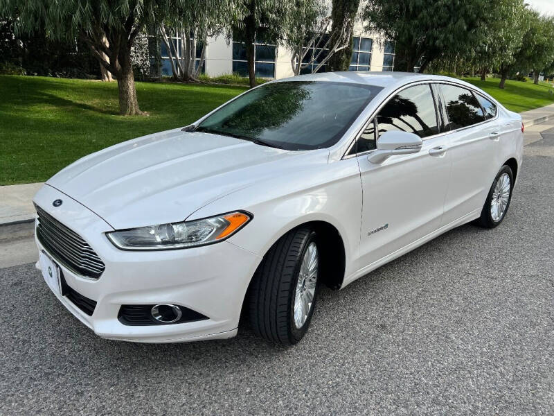 2014 Ford Fusion Hybrid for sale at GM Auto Group in Arleta CA