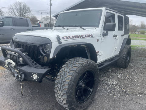 2013 Jeep Wrangler Unlimited for sale at R & J Auto Sales in Ardmore AL